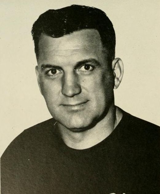 Gene Corum, head coach at West Virginia