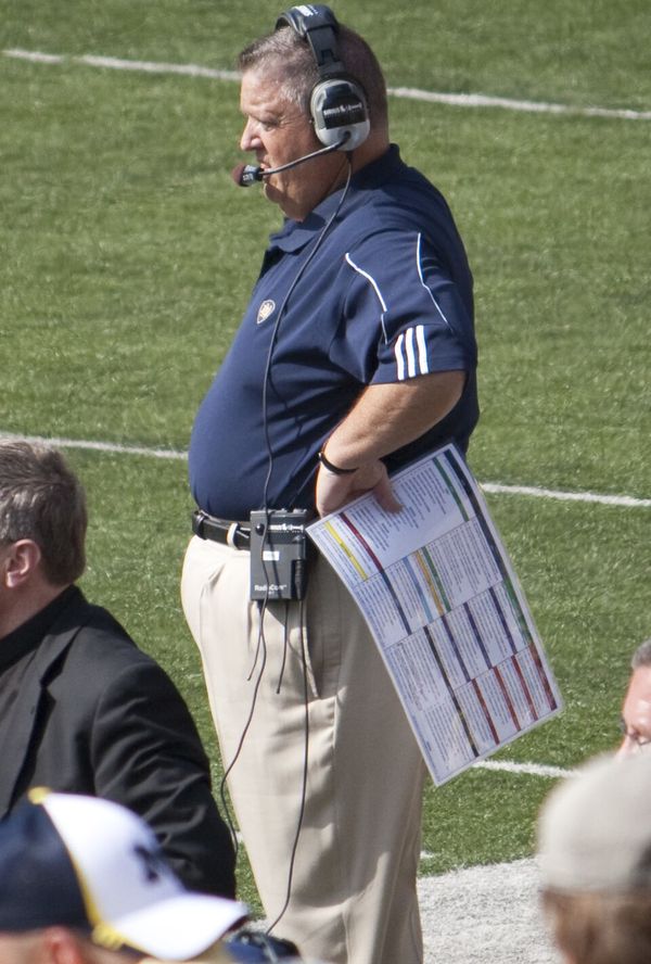 Charlie Weis, head coach at Notre Dame and Kansas