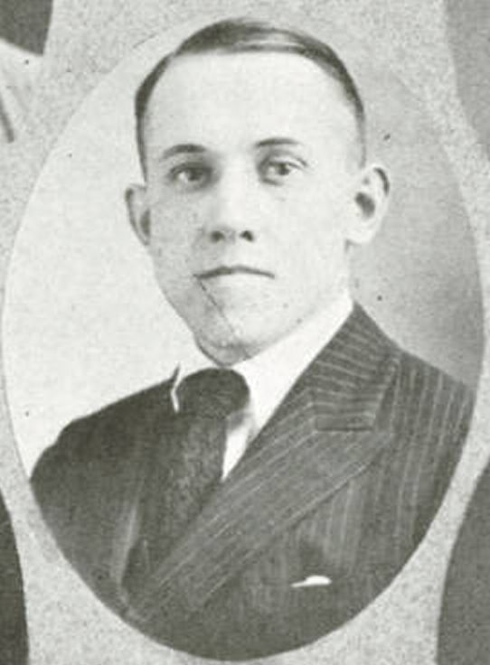E. Lowell Romney, head coach at Utah State