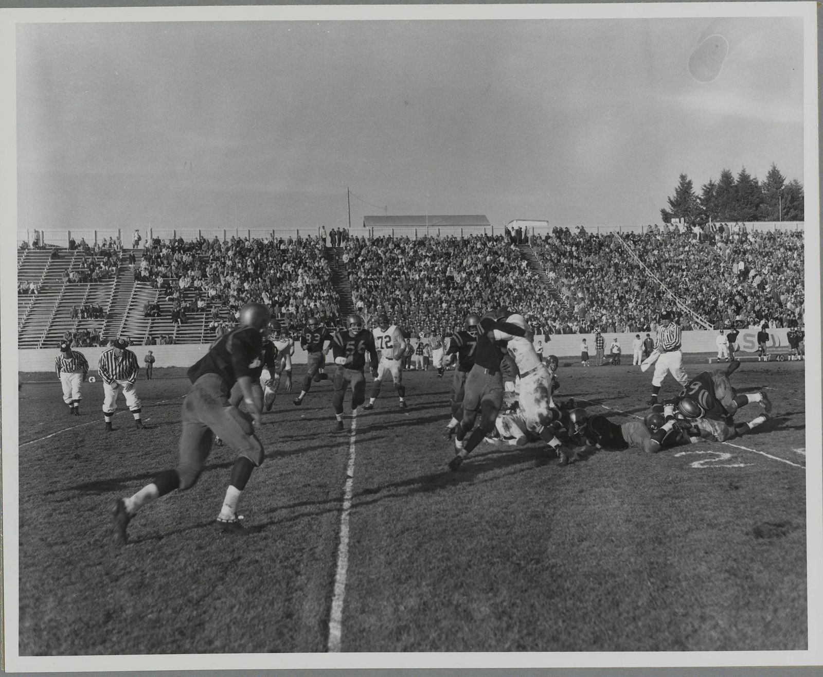 1960 Football game, University of Idaho (7) vs. Washington State University (18) In-game action [16]