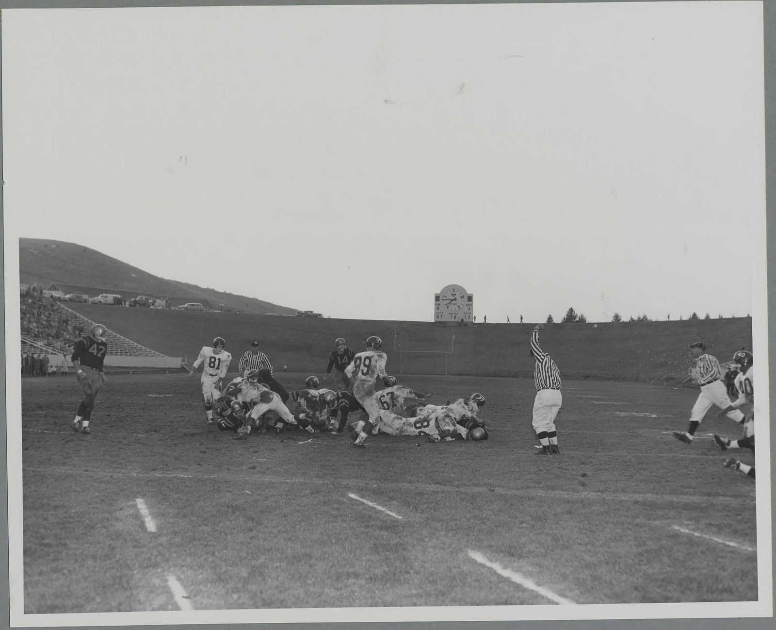 1960 Football game, University of Idaho (7) vs. Washington State University (18) In-game action [10]