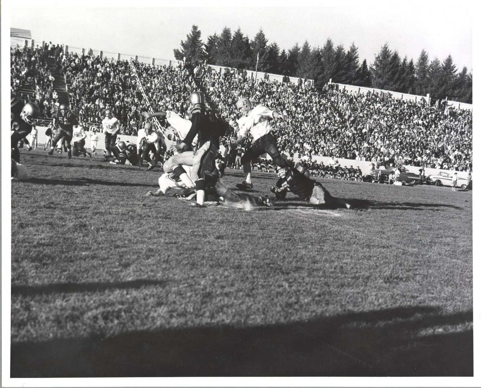 1961 Homecoming Football game, University of Idaho (20) vs. San Jose State (22) In-game action [16]