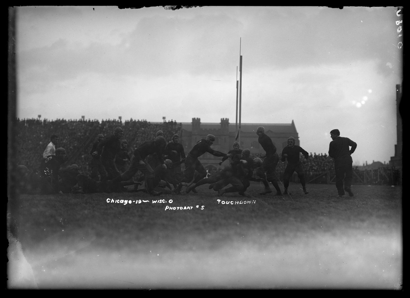 Players on the field, UW vs. Chicago