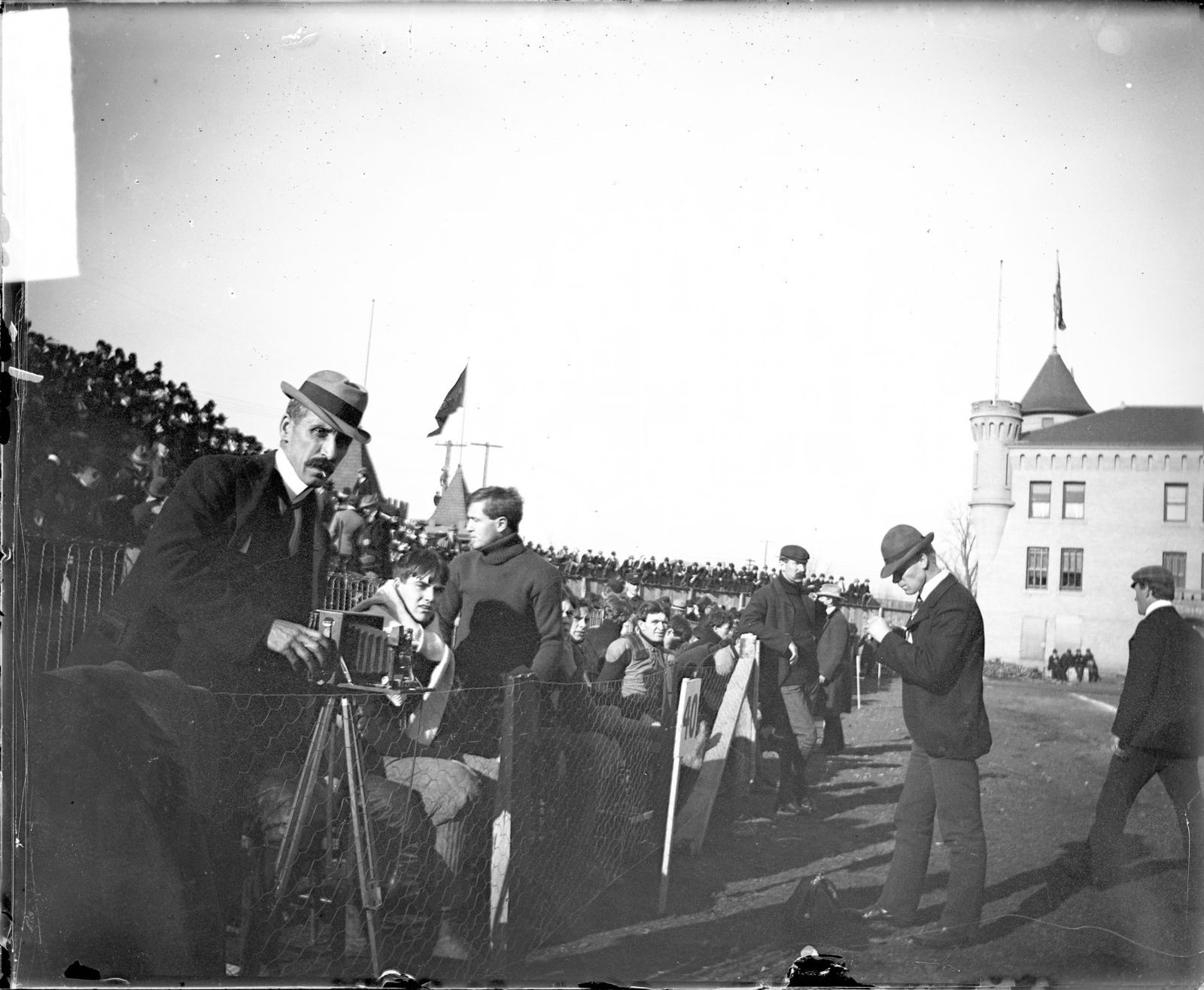 Players and Spectators on the Sidelines at a University of Minnesota Football Game