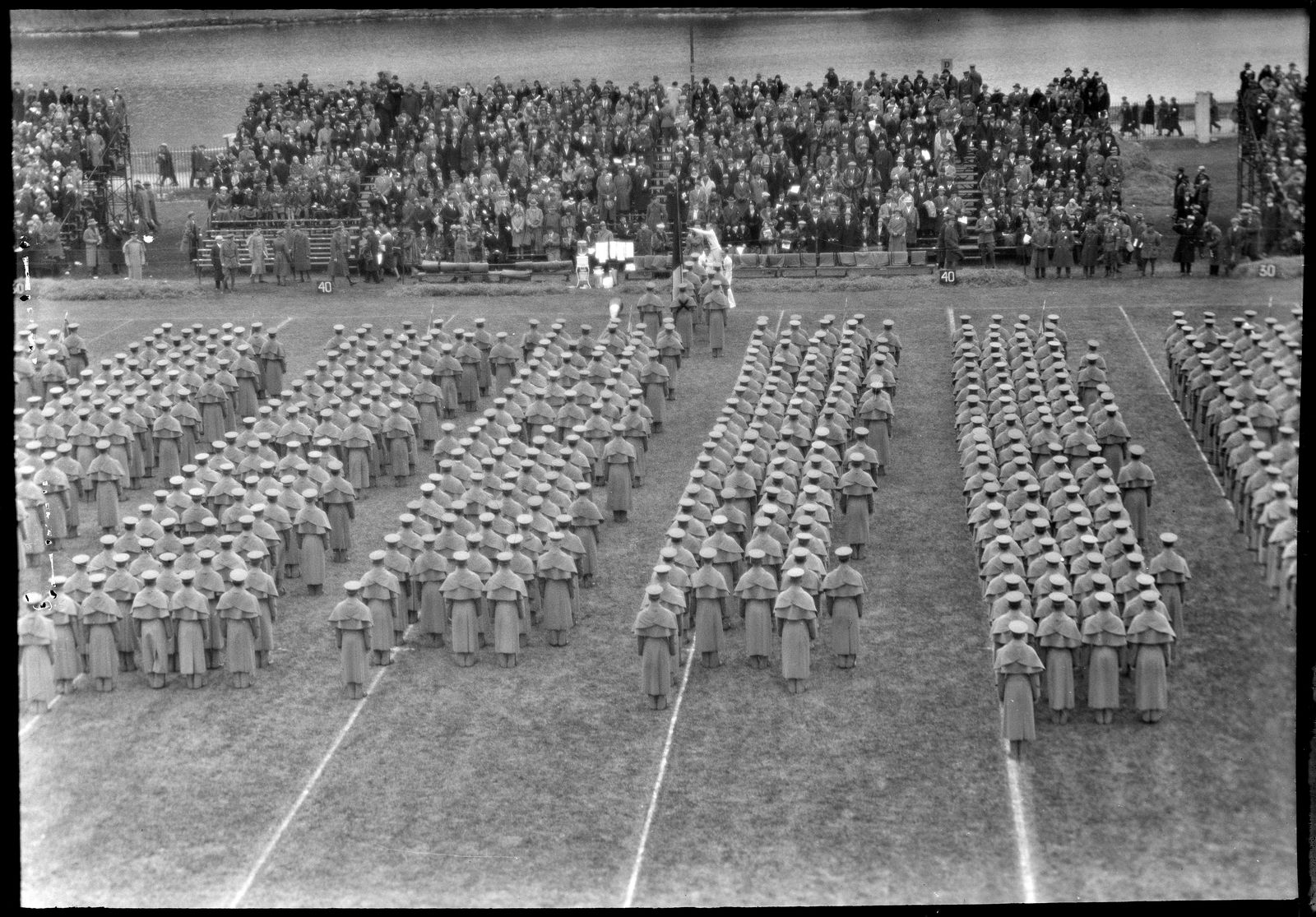 Photograph of Army-Nebraska Football Game: Corps on Field, Facing Visitors' Stands