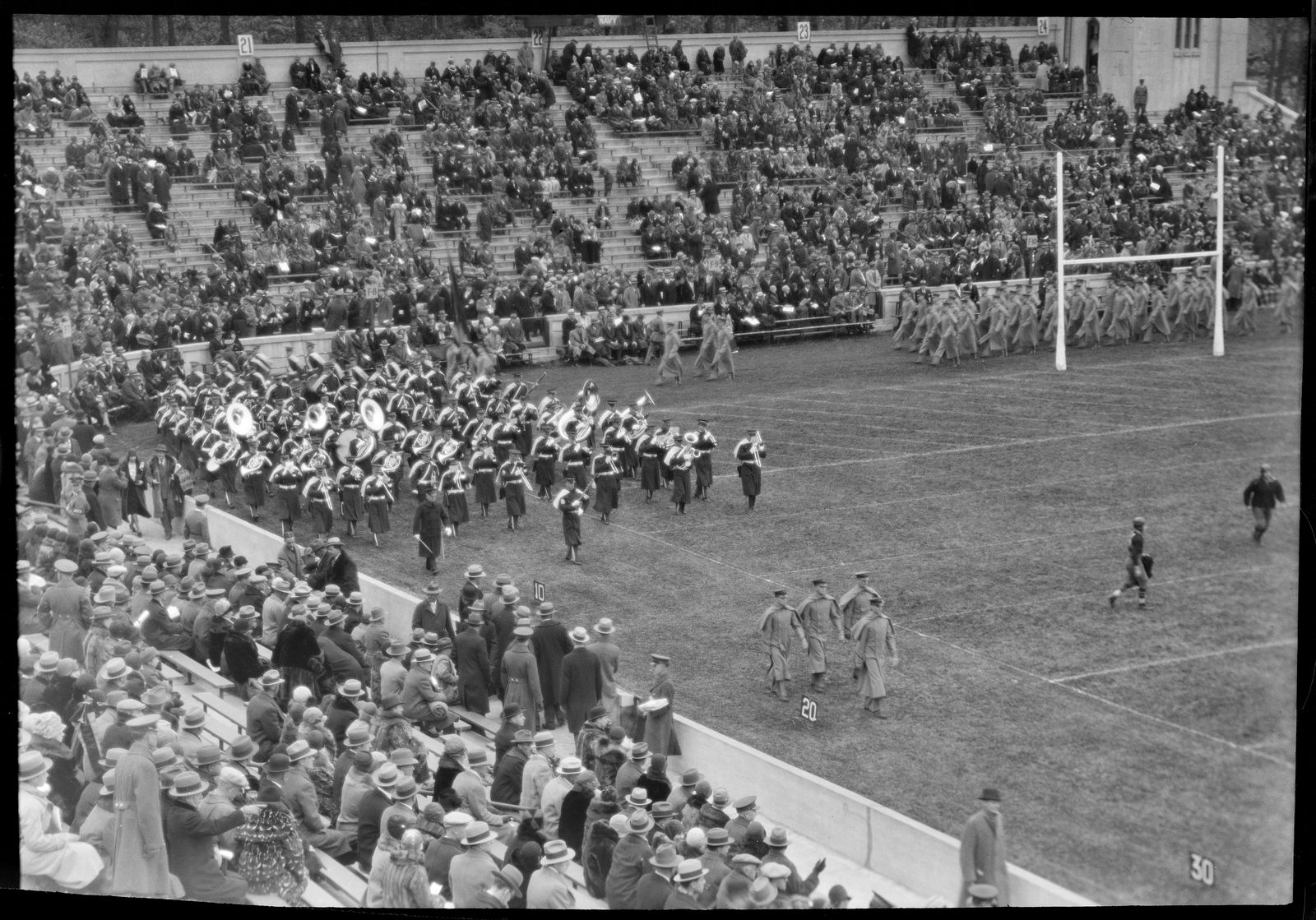 Photograph of Army-Nebraska Football Game, Michie Stadium: Band and Cadets Marching onto Field