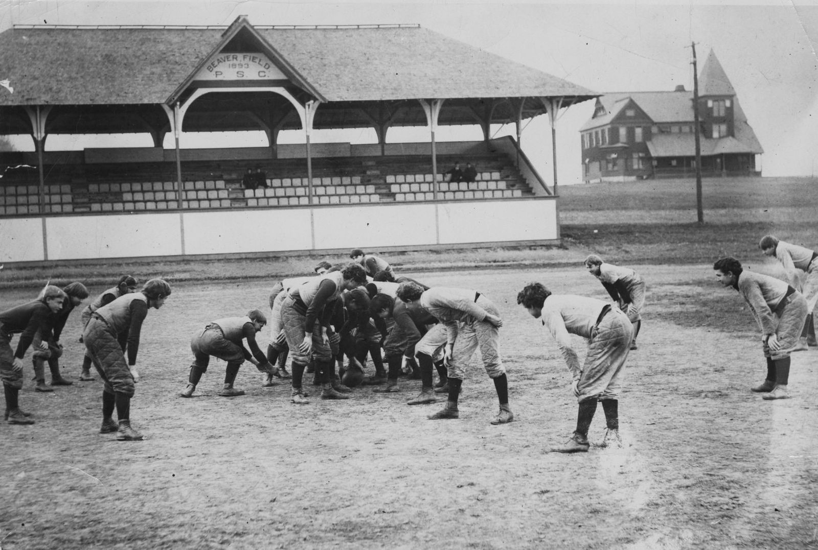 Football team practicing on Old Beaver Field