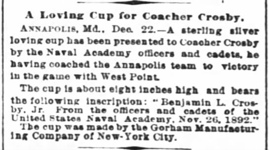 A New York Times article about Navy football coach Ben Crosby receiving a trophy from his players for their win over Army.