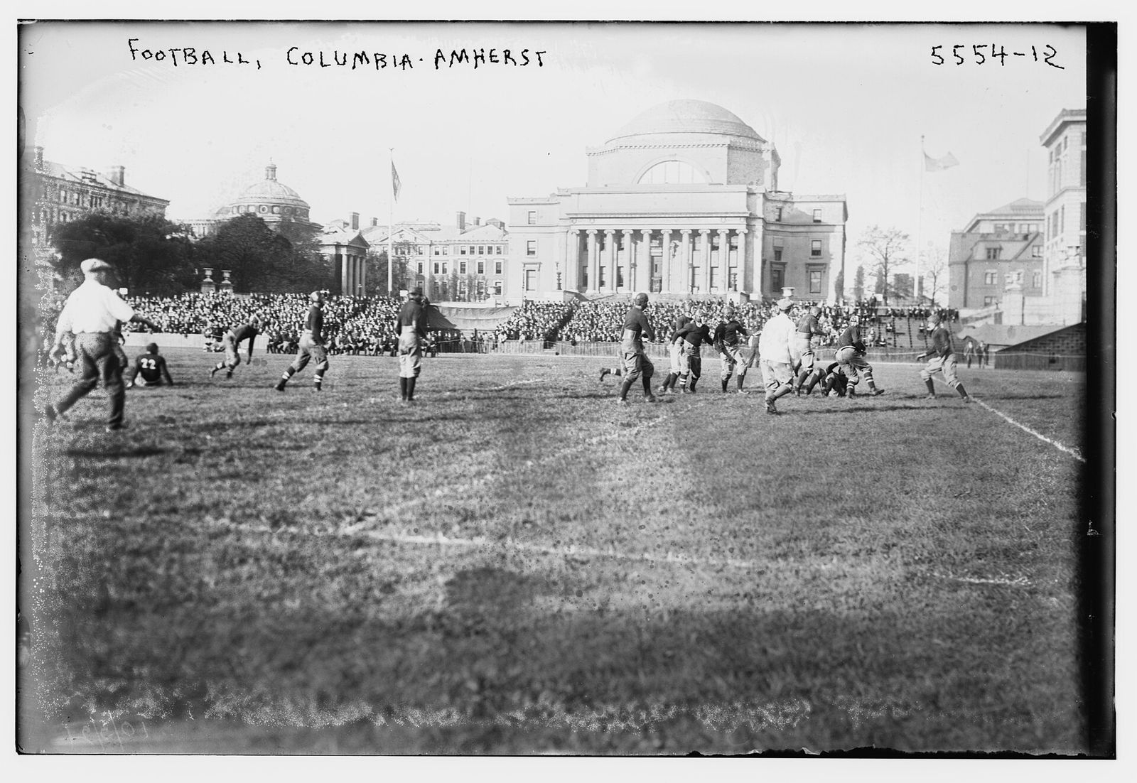 Columbia University versus Amherst College football game on October 1, 1921 at Columbia University with the Low Memorial Library in the background.