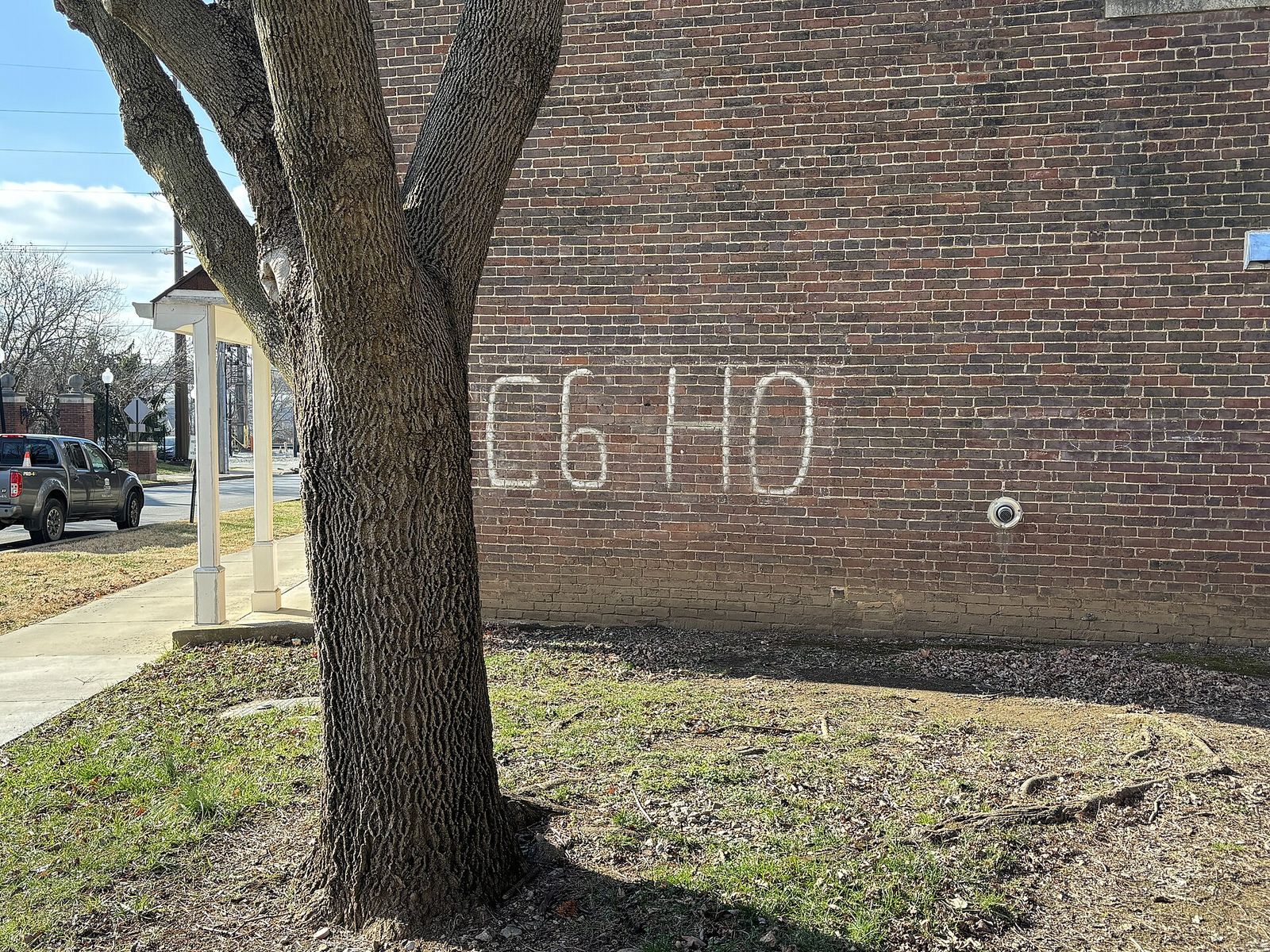 A "C6 H0" marking on the side of the 847 West Walnut building, in the Centre College Warehouse District in Danville, Kentucky
