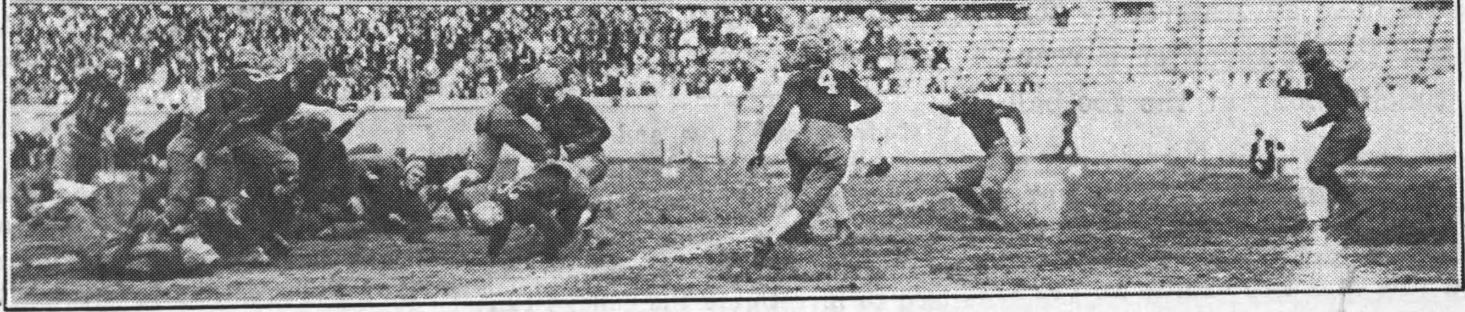 Georgia Tech football player Doug Wycoff makes a five-yard gain during their game against VMI in 1925.