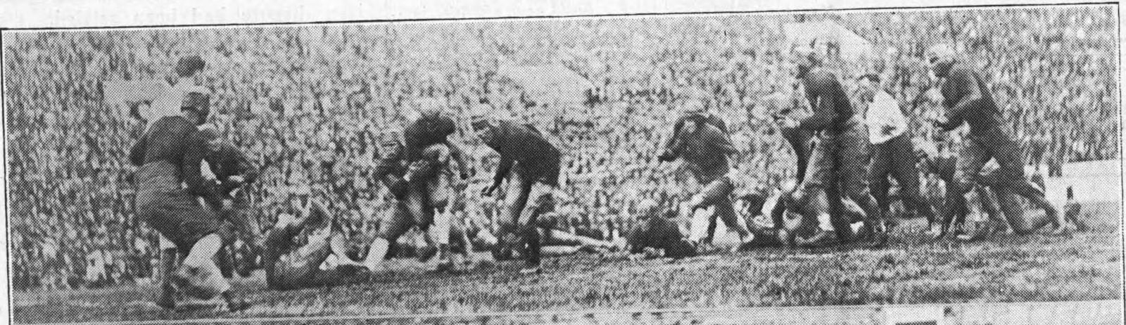 The Georgia Tech Golden Tornado play the Florida Gators in 1925. In this image, Tech player Doug Wycoff goes around the end for a gain of five yards.