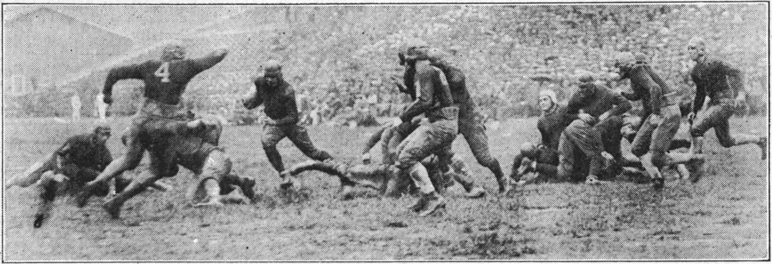 Georgia Tech and Notre Dame compete in a 1925 football game. This picture had the caption, "Herndon is thrown for a 5 yard loss".