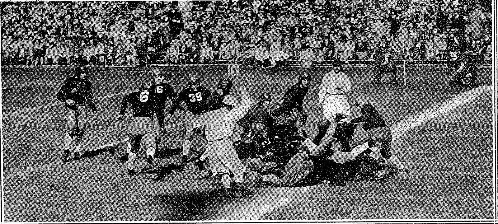 Caption text says "Edwin Griffiths, California Halfback, Scoring a Touchdown Against Pennsylvania Eleven Yesterday."