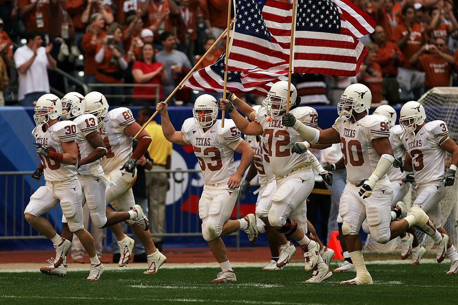 University of Texas Longhorns football players enter the field for the 2005 Bix XI Championship Game.