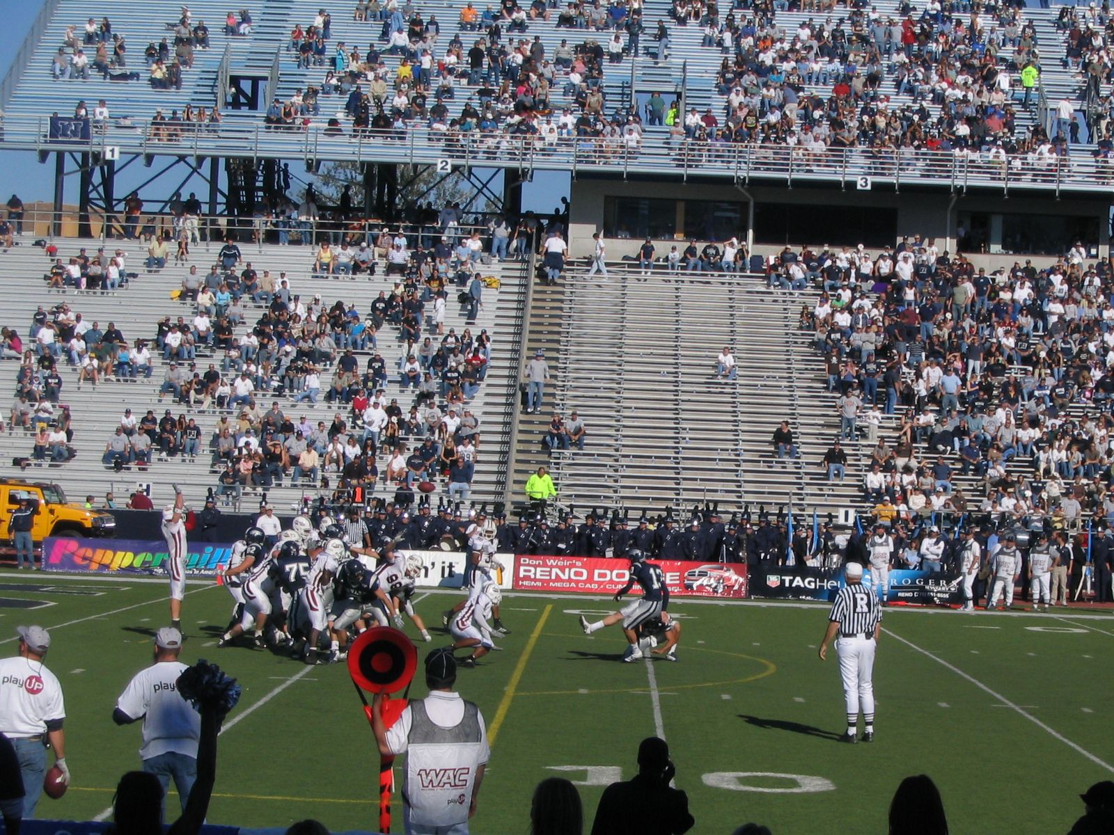 University of Nevada 48, New Mexico State University, 21. It was a blowout. Caught the kicker making this extra point.