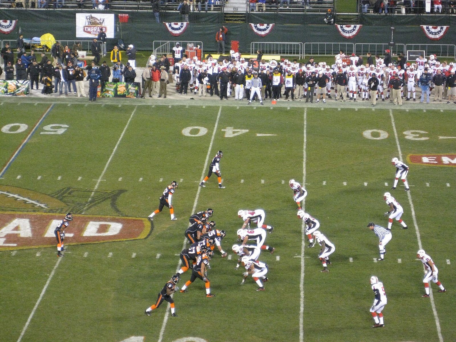 The Maryland Terrapins and Oregon State Beavers meet at the line of scrimmage in the 2007 Emerald Bowl.SF Emerald Bowl