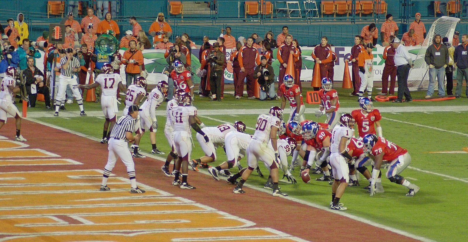 The Kansas offense lines up at the one-yard line. A fumble and two penalties would deny them a touchdown, however.