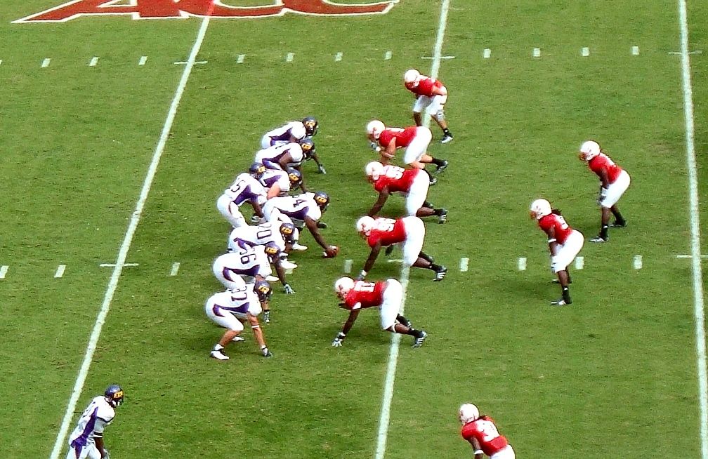 ECU prepares to hike the ball against rival NC State in Carter-Finley Stadium in 2008.