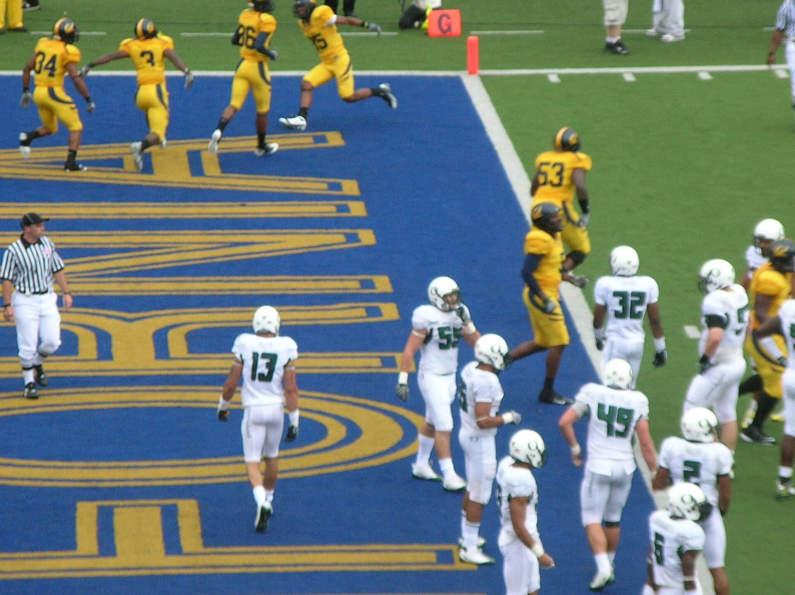 The Bears celebrate a touchdown at a Cal home game in the rain against the Oregon Ducks. The Golden Bears won 26-16.