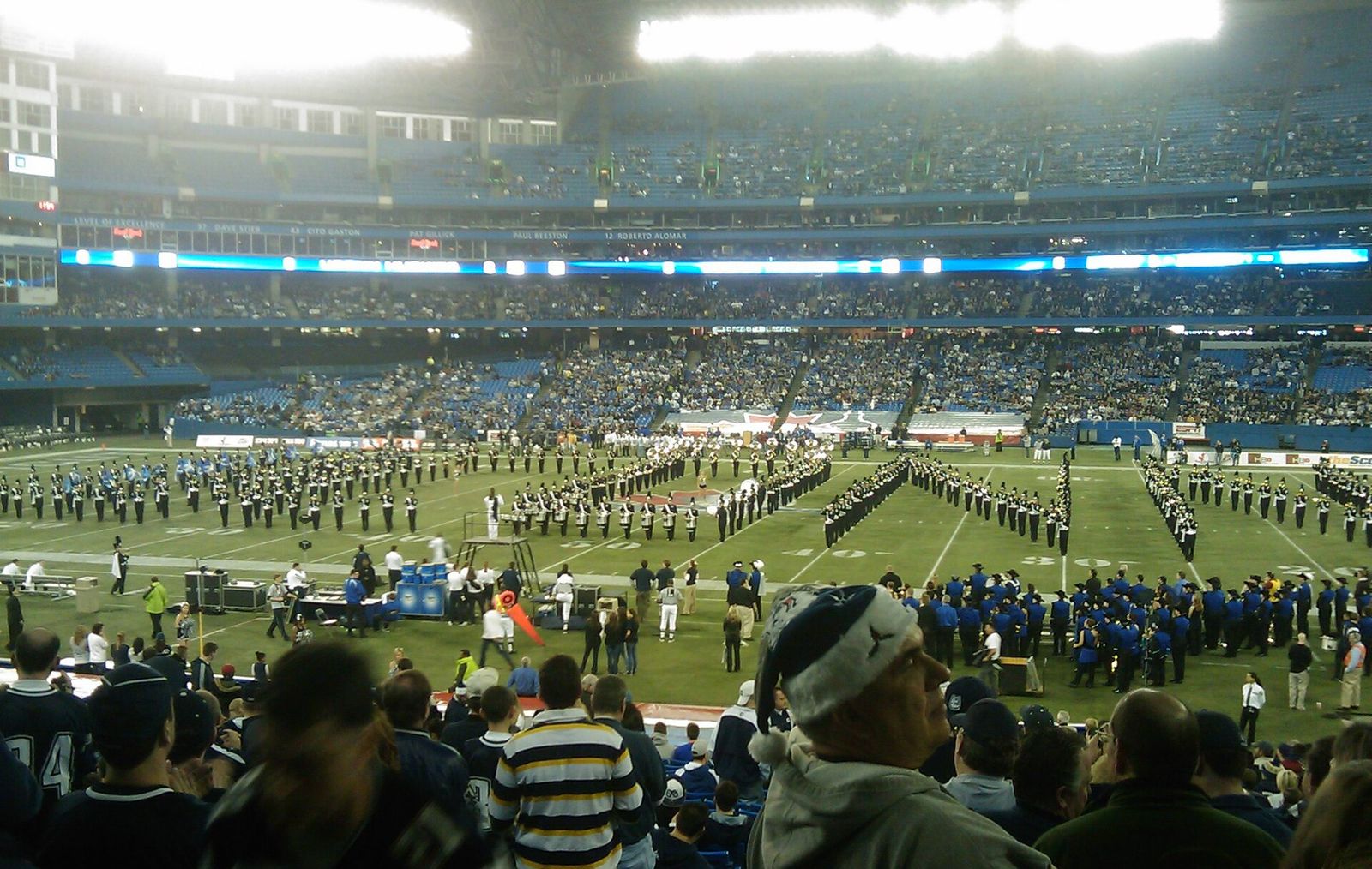 The University of Connecticut marching band performs prior to the kickoff of the 2009 International Bowl.