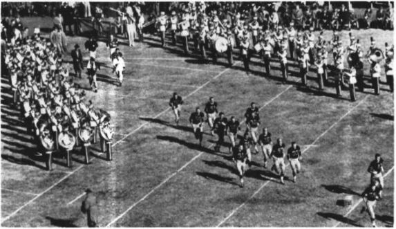 Georgia Tech Yellow Jackets football players run unto the field during their 1949 football game against the Georgia Bulldogs
