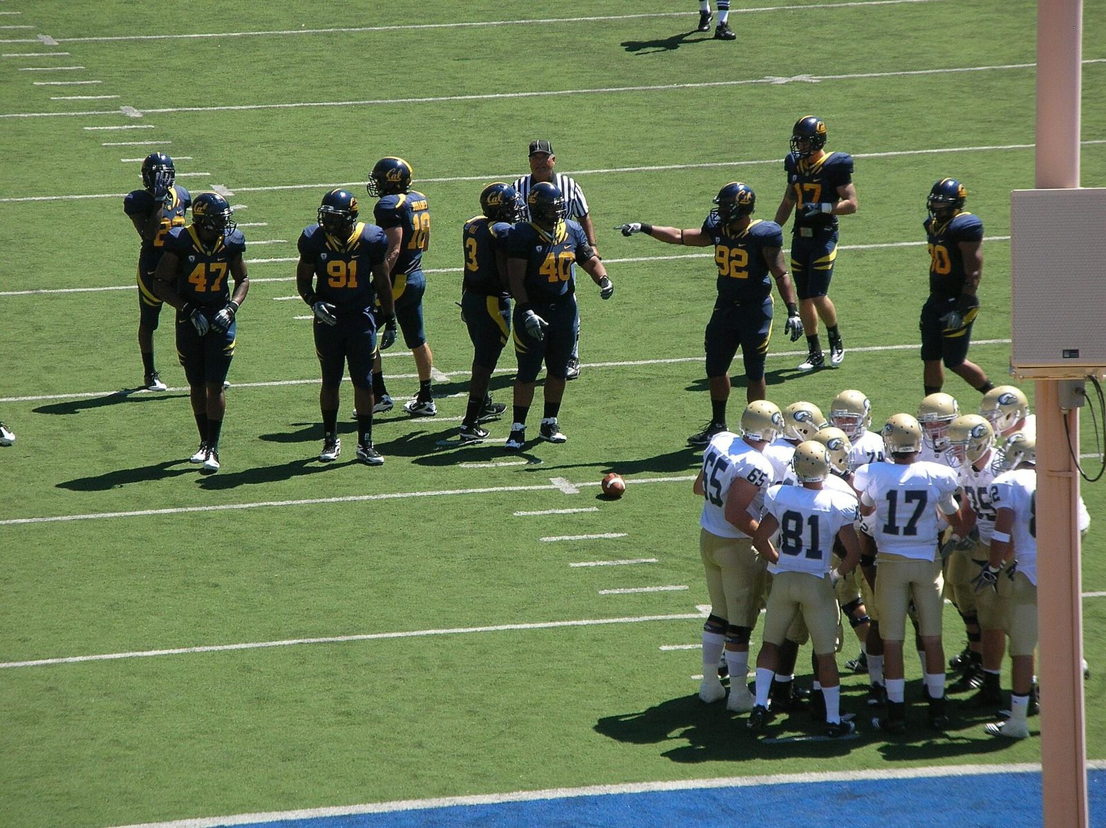 The UC Davis Aggies in a huddle during a road game against the California Golden Bears. The Golden Bears won 52-3.