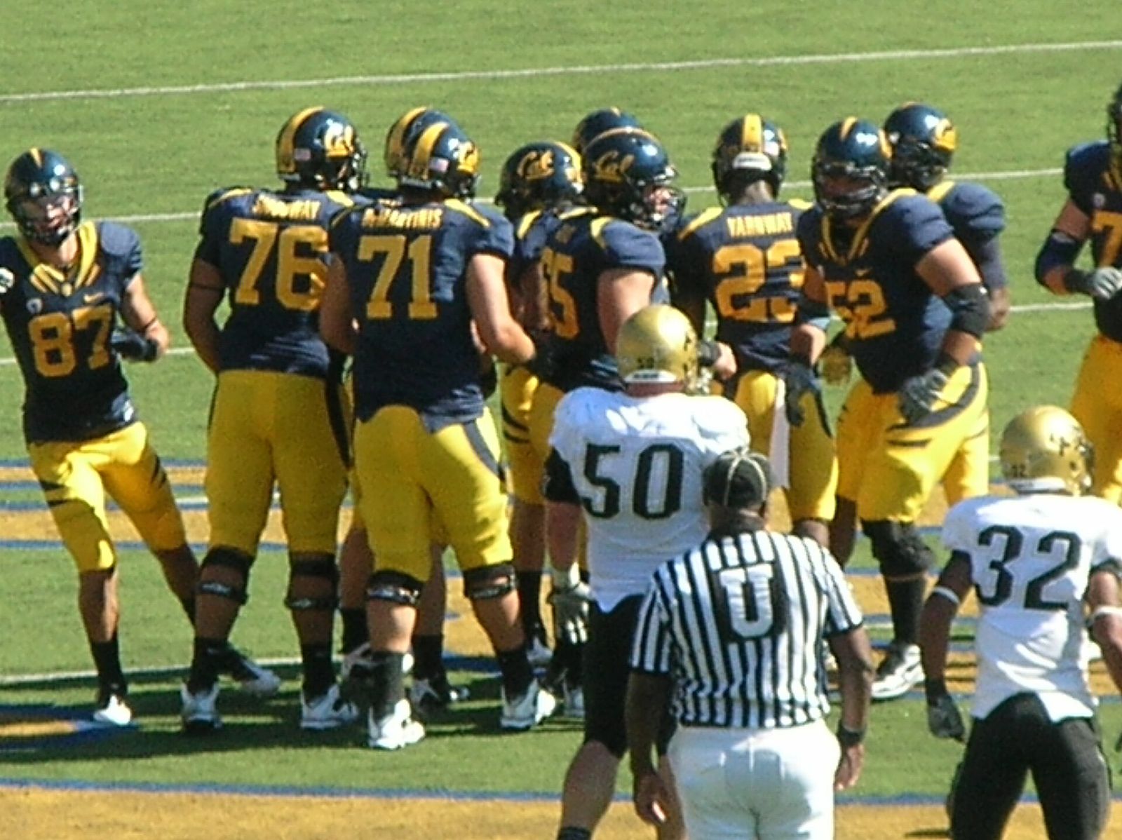 Cal in a huddle during a home game against the Colorado Buffaloes. The Golden Bears won 52-7.