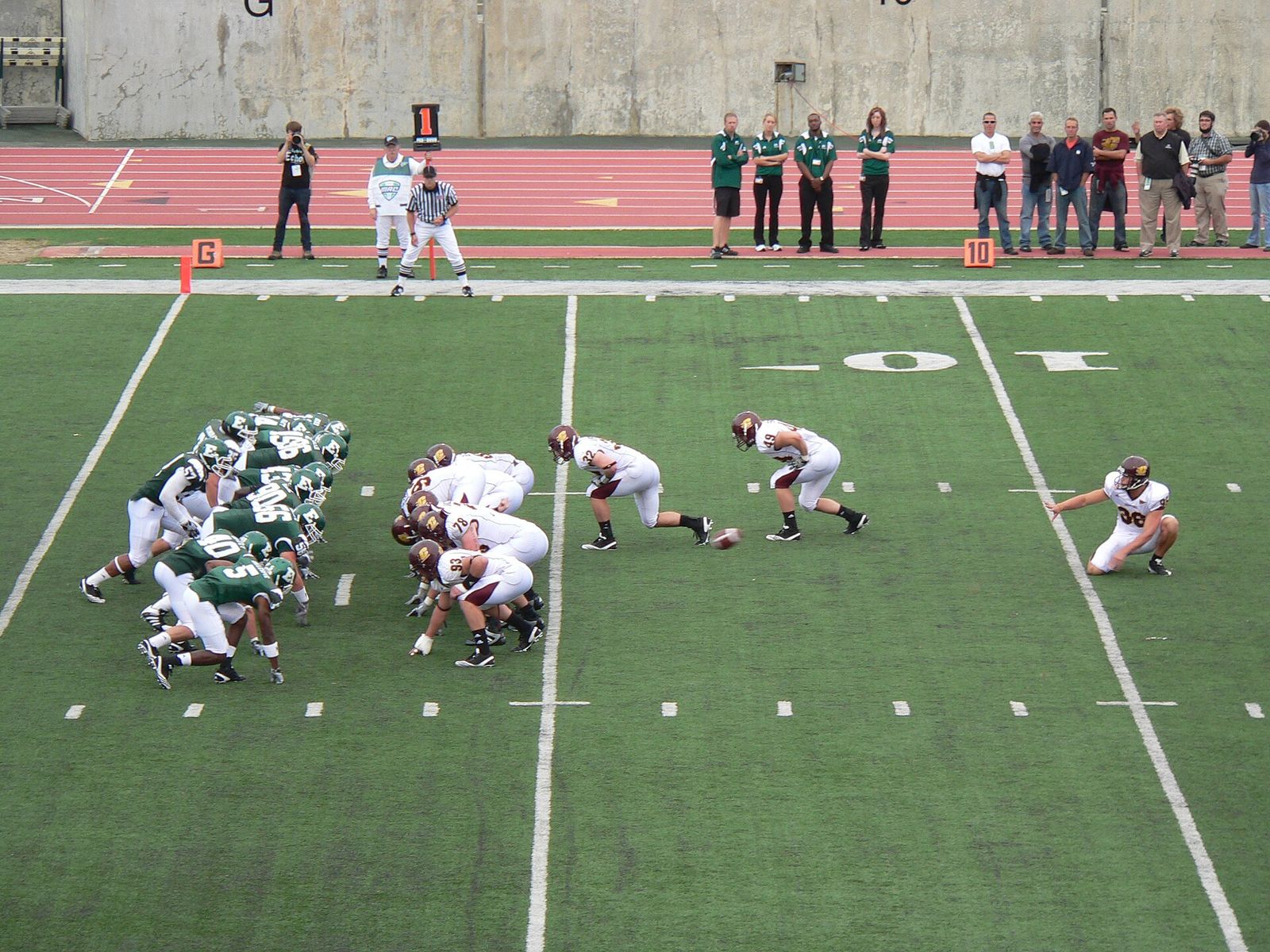 Central Michigan snaps the ball for a PAT against EMU.