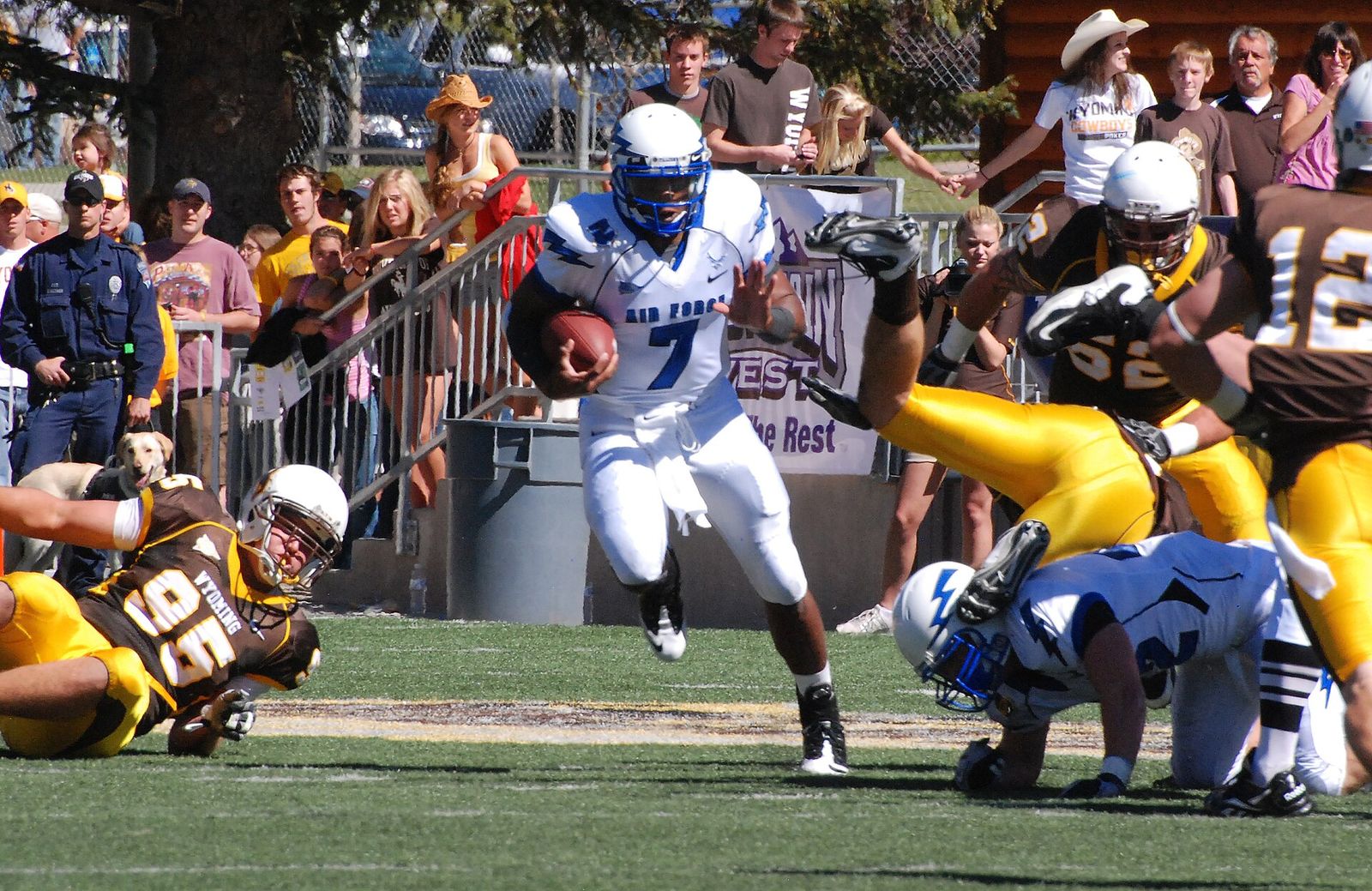Falcons quarterback Tim Jefferson runs upfield for a 12-yard gain during the Air Force-Wyoming game in Laramie, Wyoming. Air Force won 20-14.