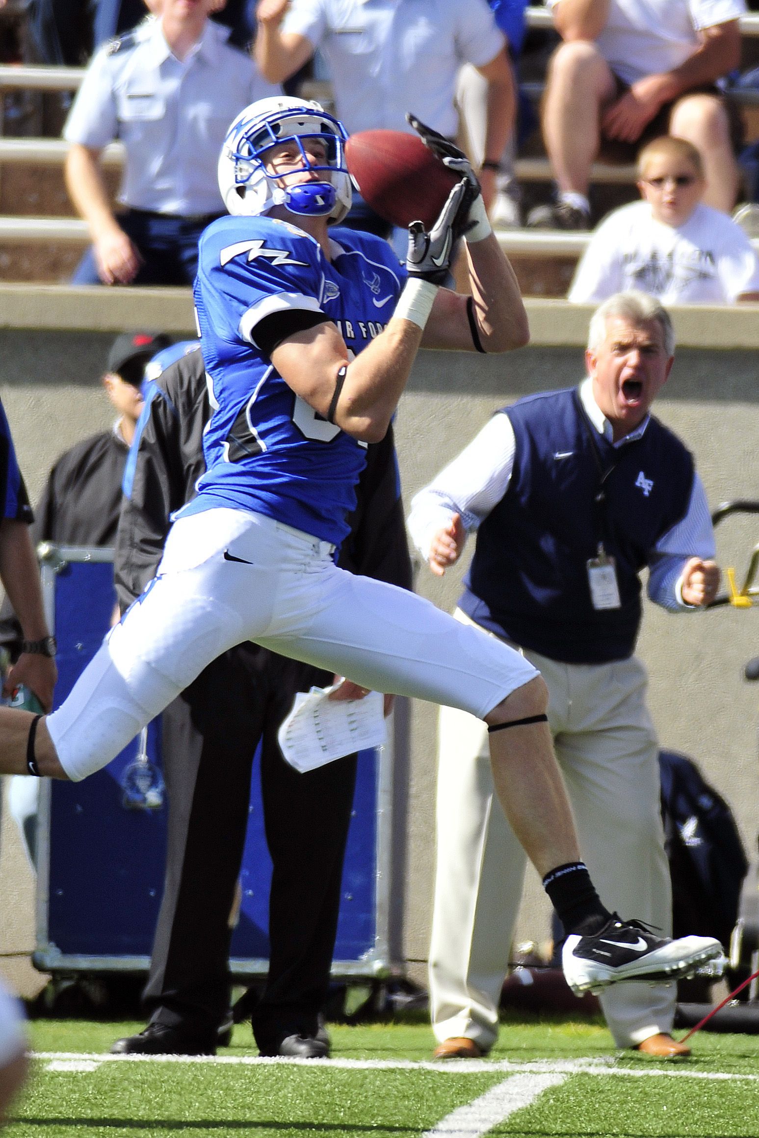 Falcons wide receiver Brandon Hirneise makes a leaping catch during the Air Force-Colorado State game at Falcon Stadium. Air Force won 49-27.
