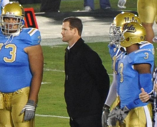 Cade McNown does the coin toss