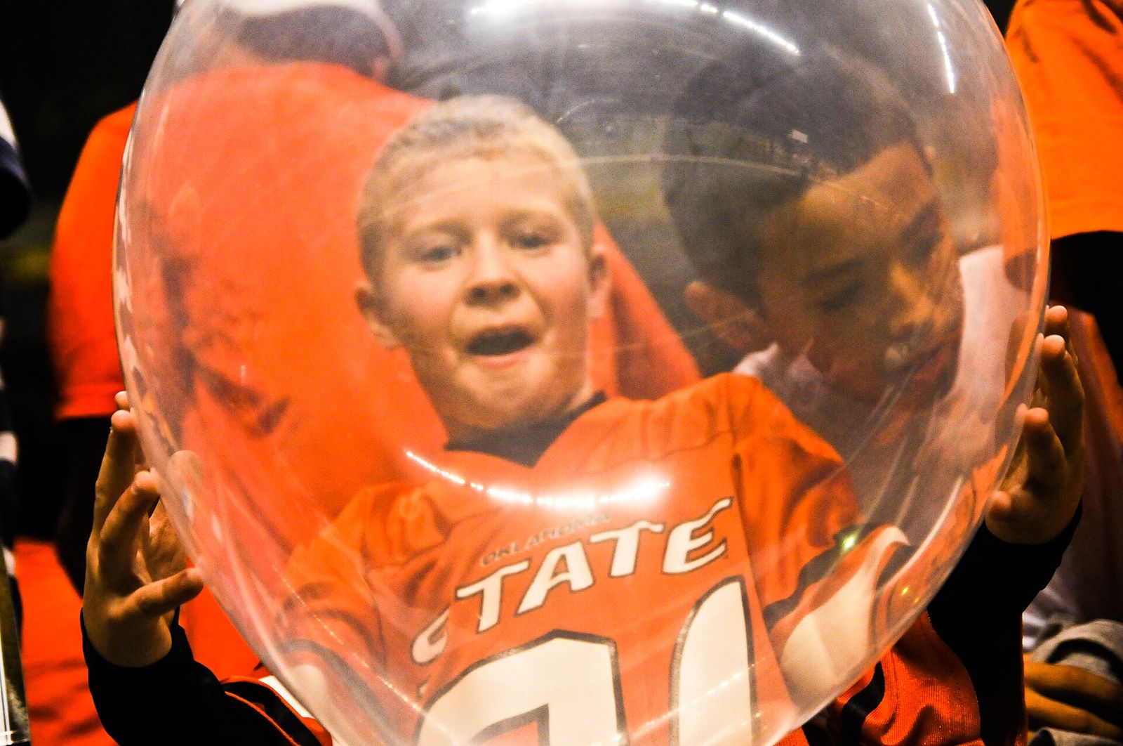 A Young Oklahoma State fan shows his pride