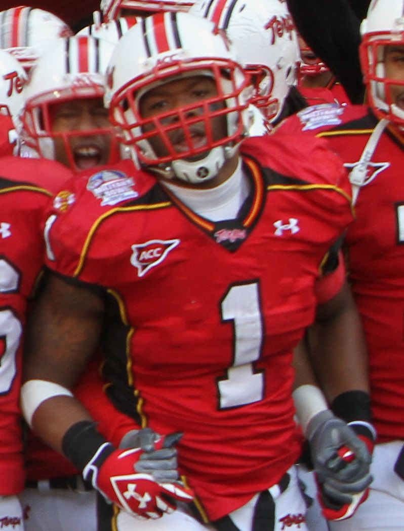 Coach Ralph Friedgen and the University of Maryland Terrapins entering the field for the 3rd annual Military Bowl game against East Carolina University