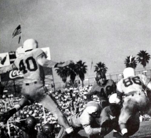 Clemson's Lawrence Grissette is tackled by the Miami defense in the 1952 Gator Bowl
