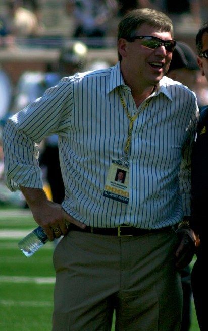 Dave Brandon (left) and Brady Hoke.