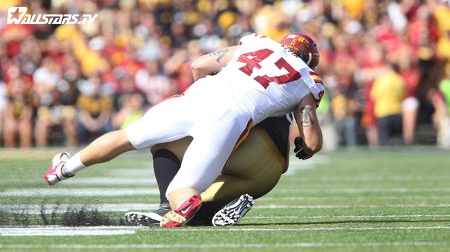 AJ Klein makes a Hawkeye disappear Photo by Reese Strickland
