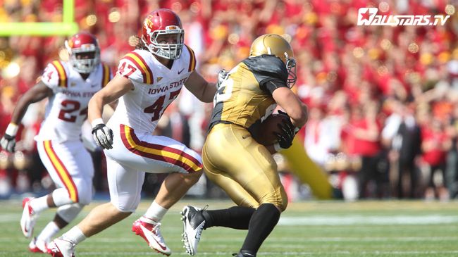 AJ Klein sets sights on the ball carrier Photo by Reese Strickland