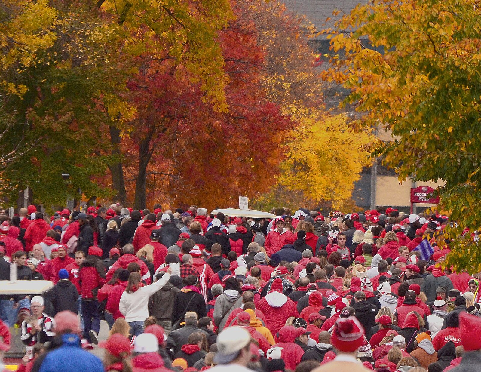 Wisconsin Badger football fans on Breese Terrace below Camp Randall Stadium prior to the start of a game against Illinois