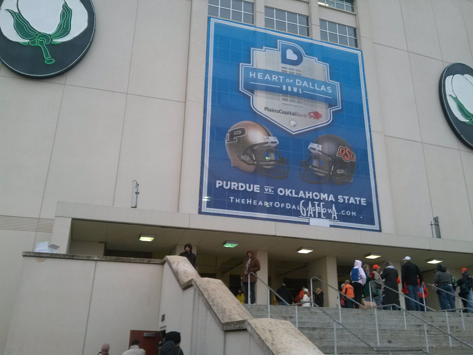 Banner at the entrance of the Cotton Bowl for the 2013 Heart of Dallas bowl game between Purdue University and Oklahoma State University.