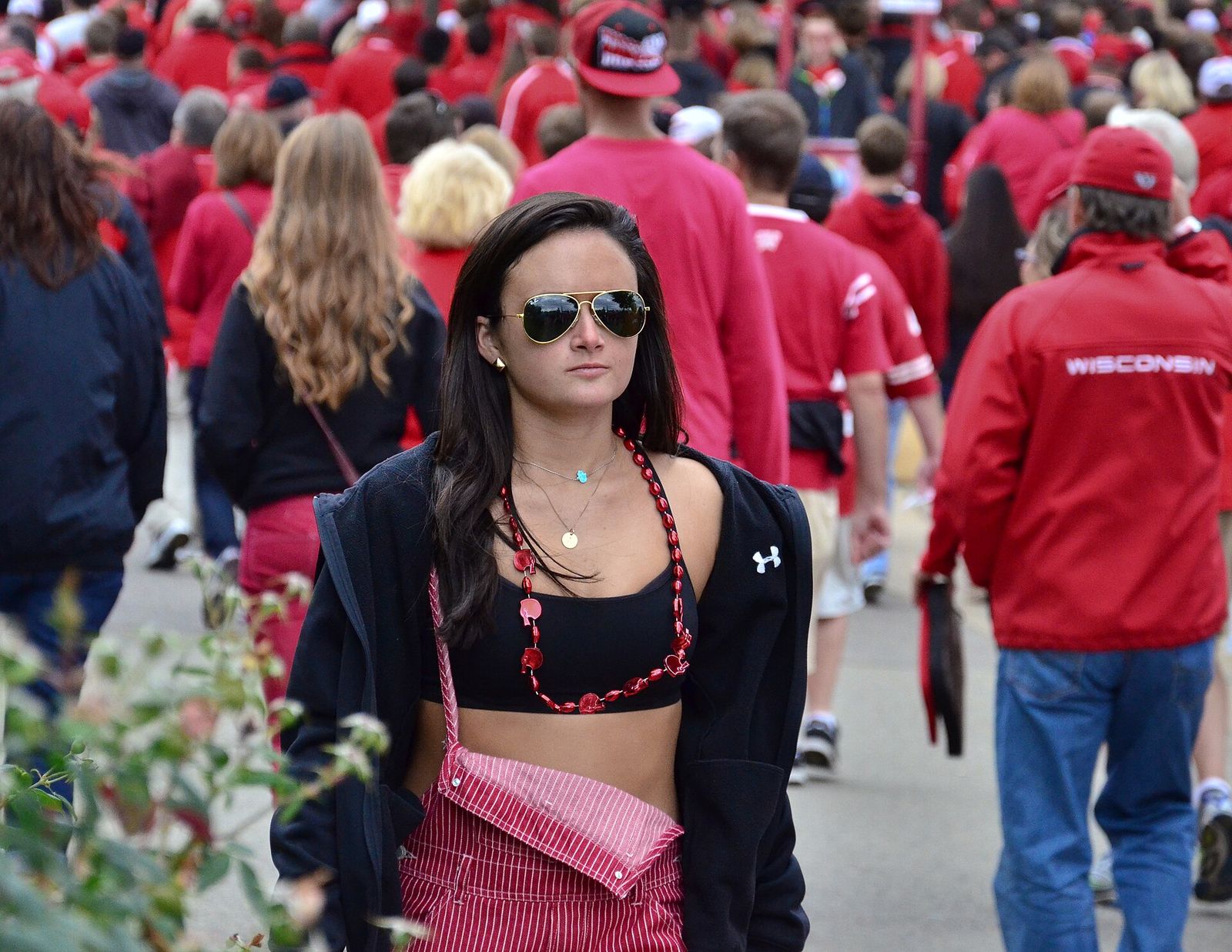 Badger football fan outside Camp Randall Stadium prior to the start of a game