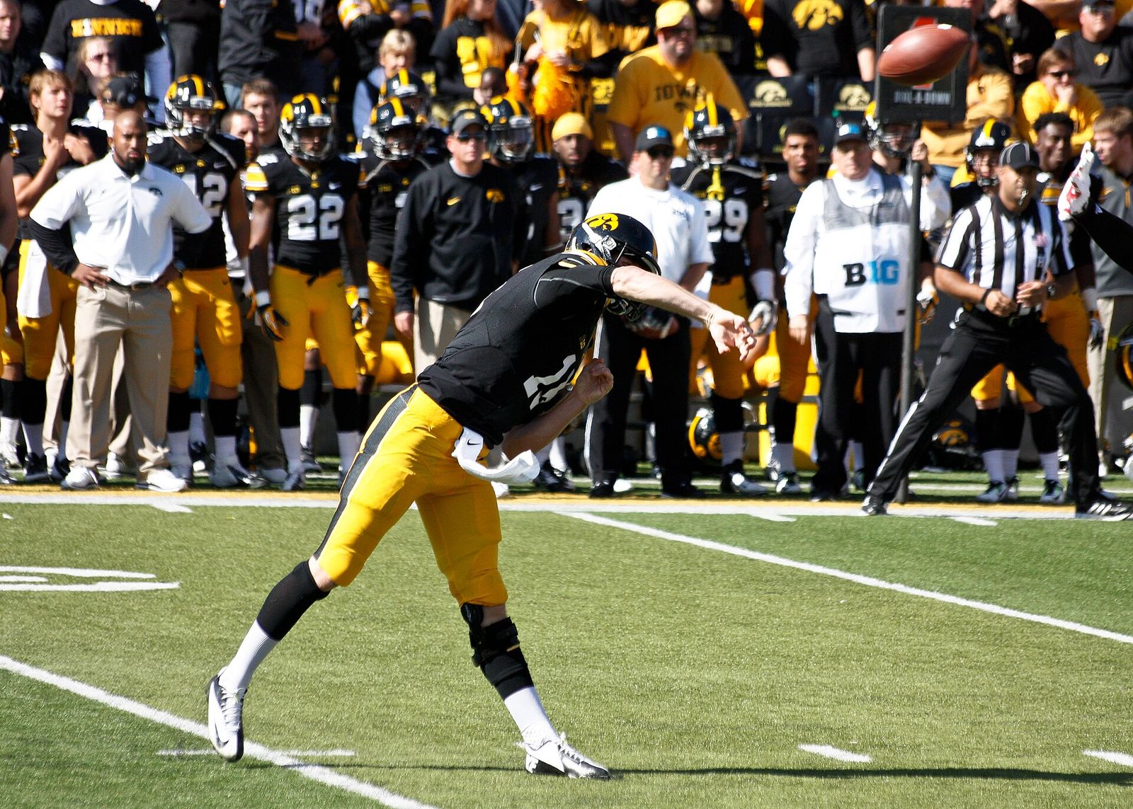 The ball in flight. Photos from the University of Iowa homecoming game on Saturday, October 11, 2014. The Hawkeyes beat the Indiana Hoosiers 45-29.