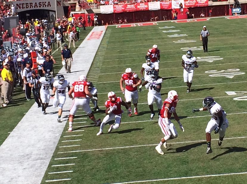 Ameer Abdullah running north to south in Memorial Stadium during the Nebraska vs. Florida Atlantic college football game on August 30, 2014