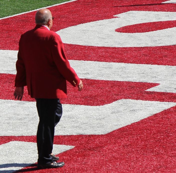 Wisconsin Badgers athletic director and former football coach Barry Alvarez walking on the field at the Badgers vs. Western Illinois game.