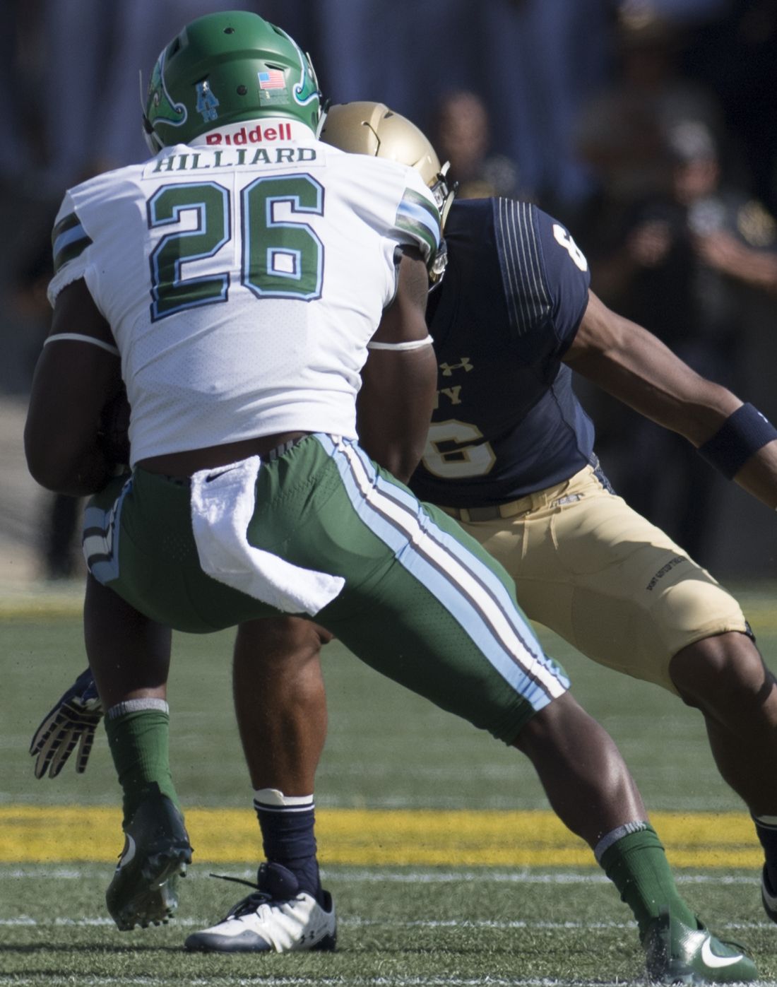 A September 2017 football game between the Tulane Green Wave and Navy Midshipmen at Navy–Marine Corps Memorial Stadium.