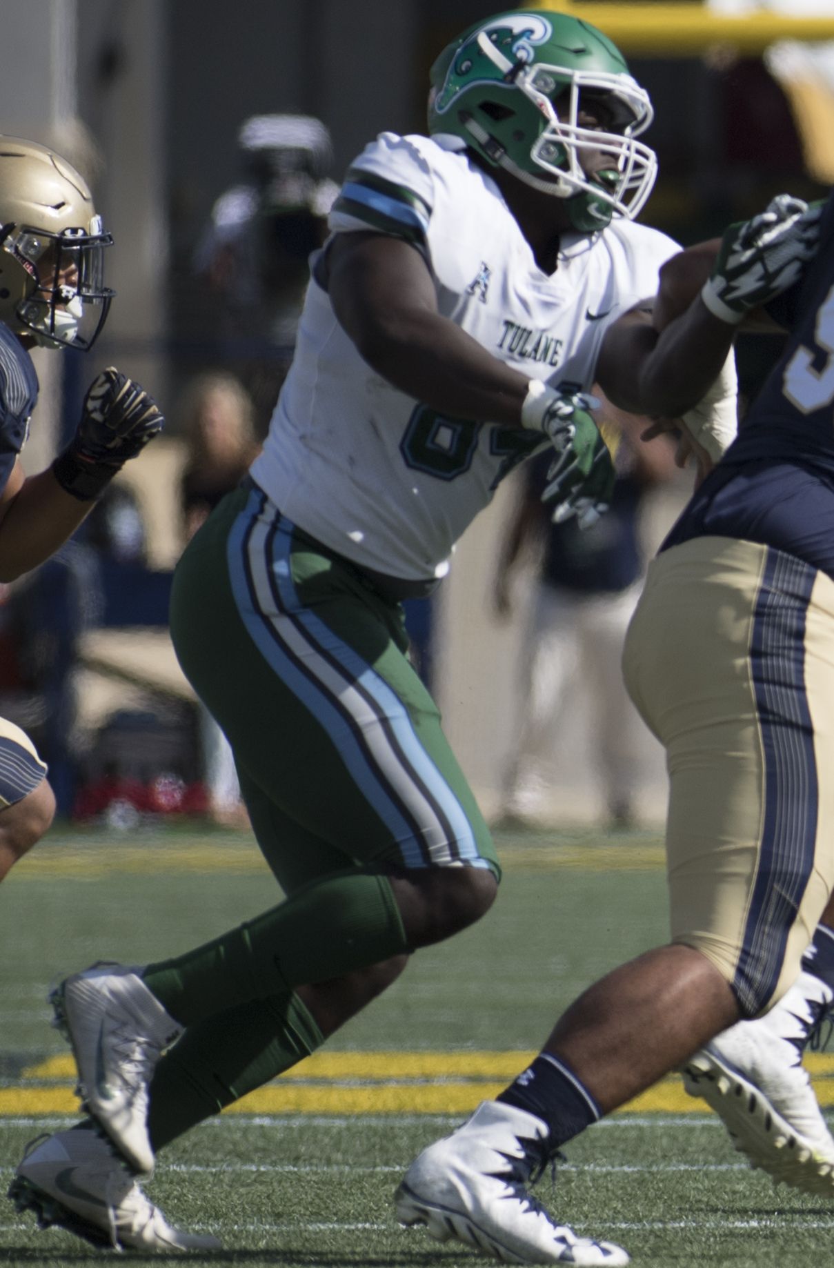 A September 2017 football game between the Tulane Green Wave and Navy Midshipmen at Navy–Marine Corps Memorial Stadium.