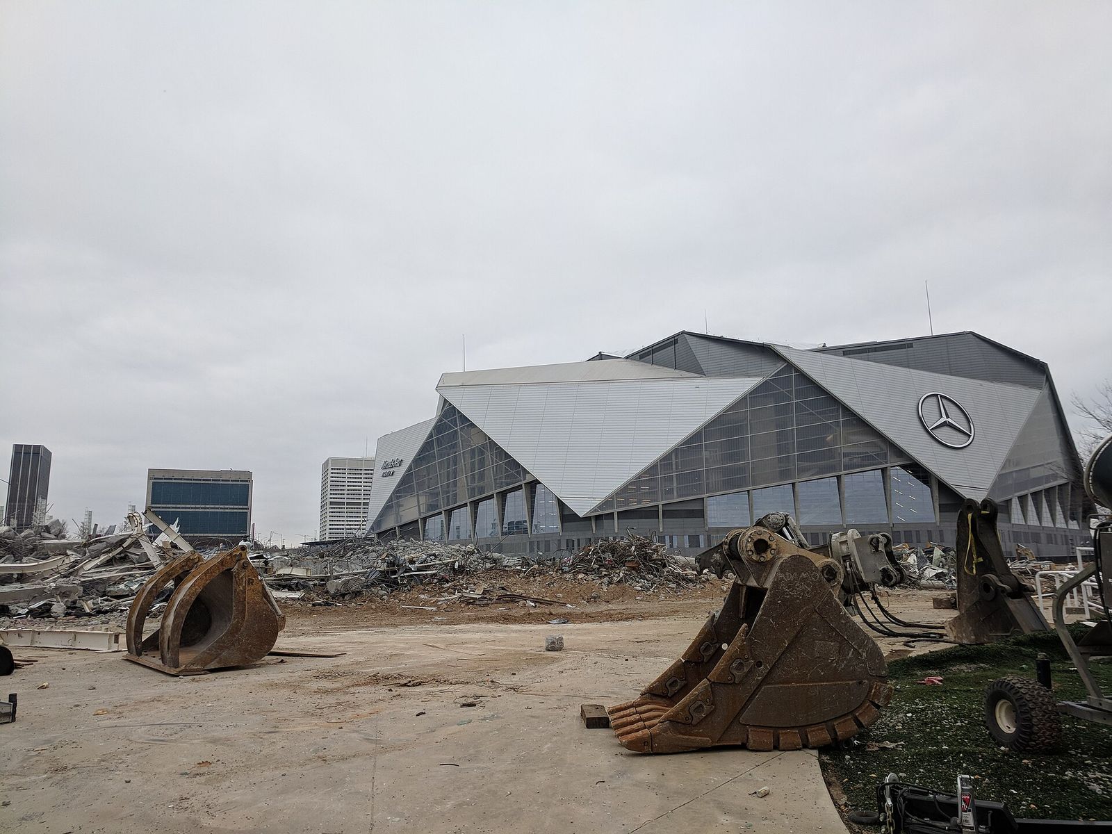 Mercedes-Benz Stadium with the Georgia Dome remains in the foreground