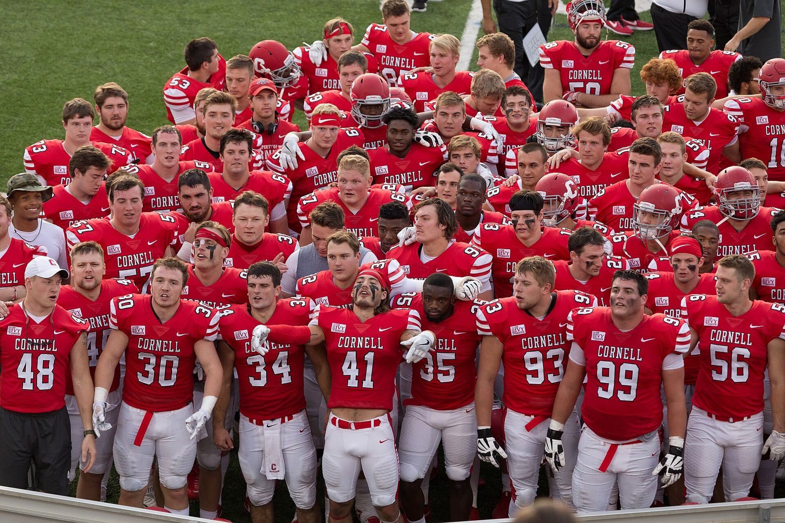 Cornell University football team celebrates after their 34-7 Homecoming win over Brown University. Schoelkopf Field, Ithaca, New York, October 21, 2017.