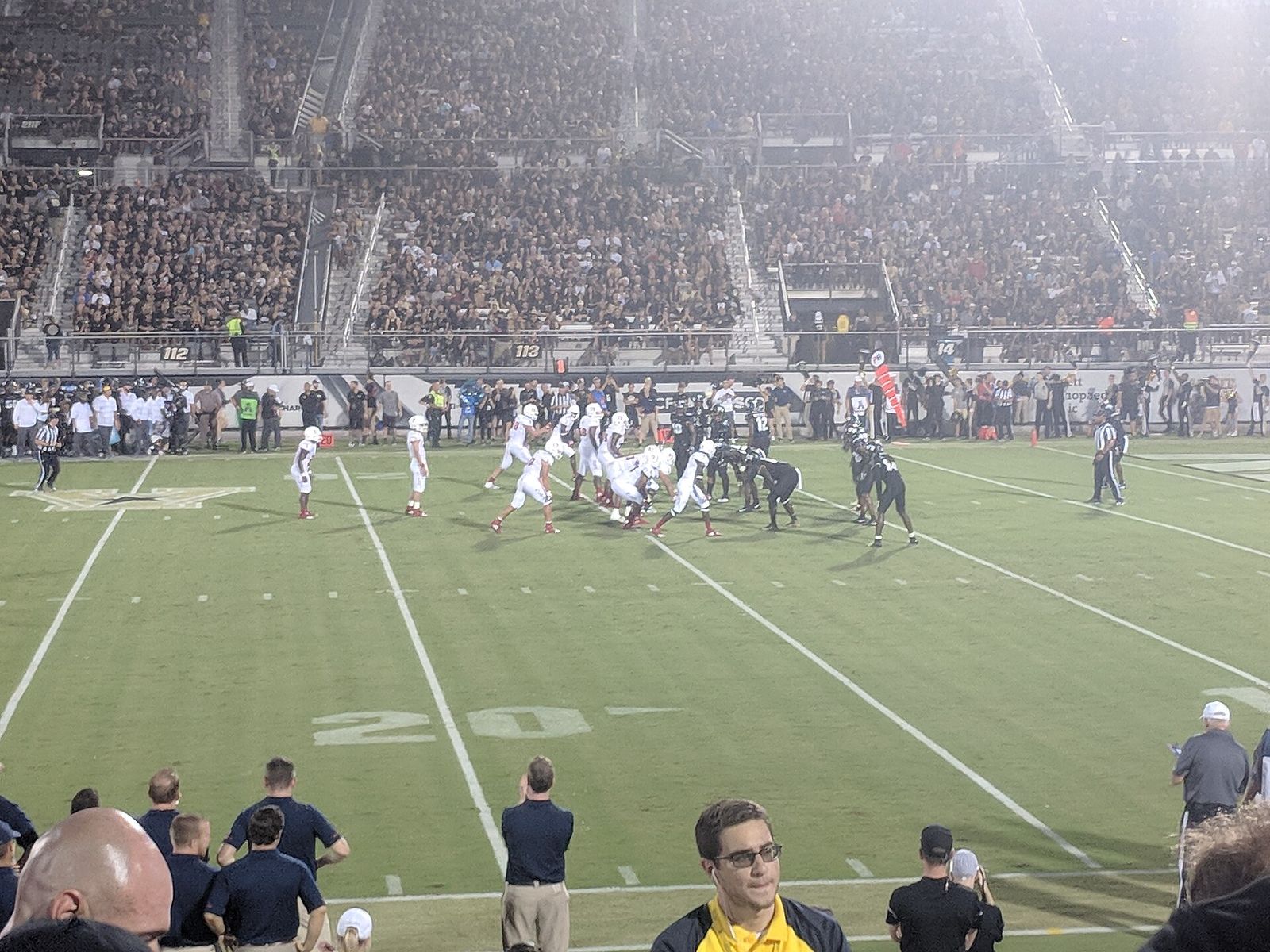 FAU lining up at UCF's 13 yard line for 1st and 10, with 1:08 left in the first quarter. Pass would be incomplete to John Raine