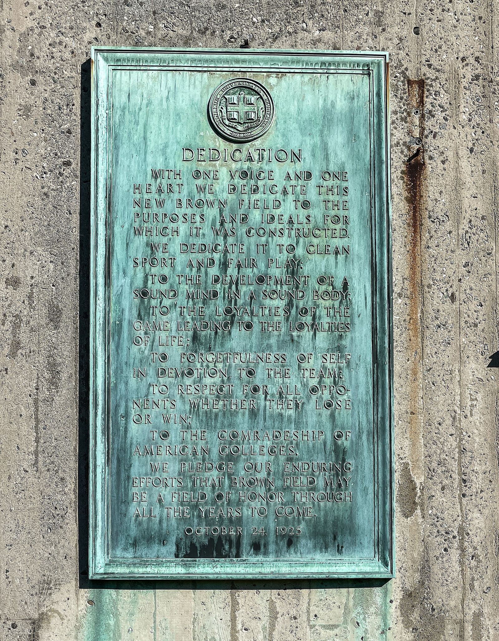 Brown Stadium dedication plaque. This plaque is on the exterior of the Brown University football stadium, near the main entrance.